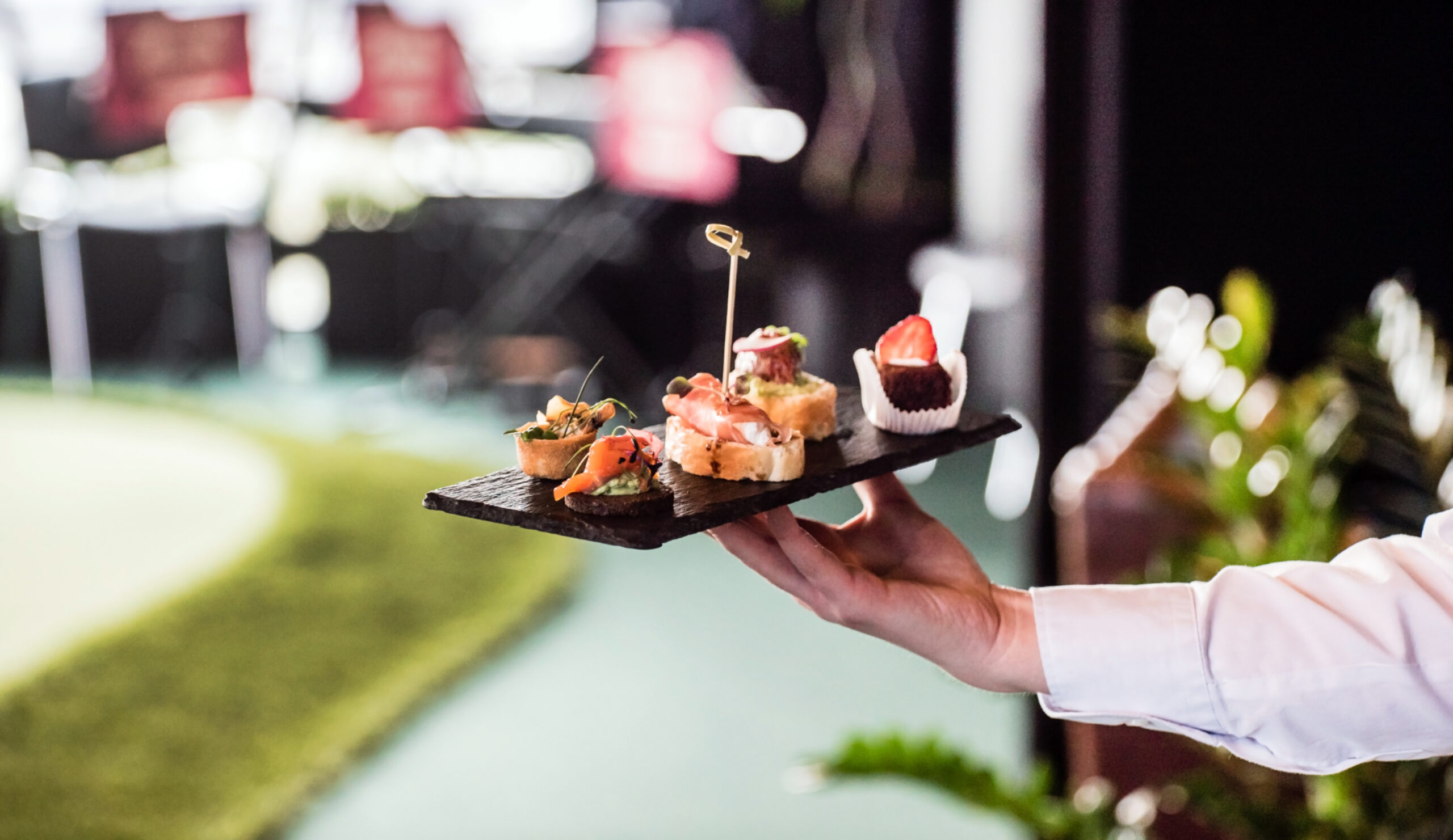 waiter with spanish appetizer